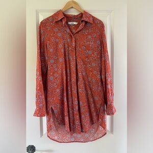 Beach cover up or blouse that ties in front.
